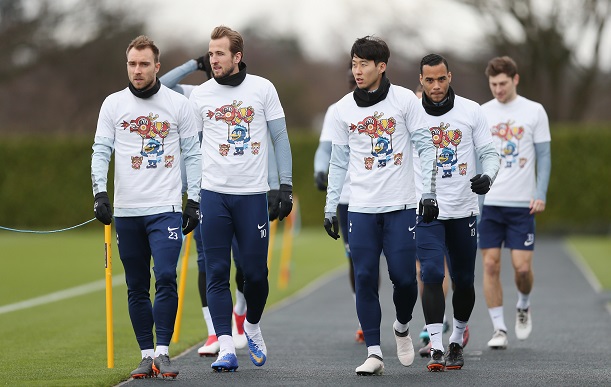 Tottenham Hotspur train in special edition CNY t-shirts 1.jpg